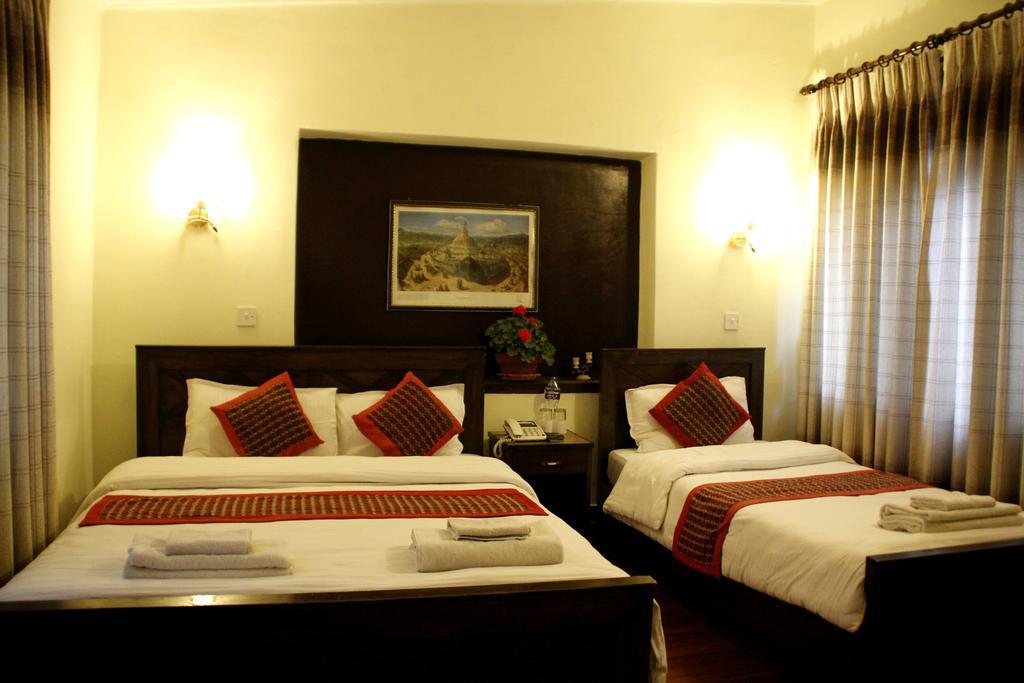 Hotel Peace N Park Catmandu Quarto foto